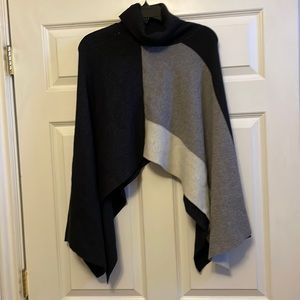 Pull over sweater (short in length) Best worn with an undershirt
